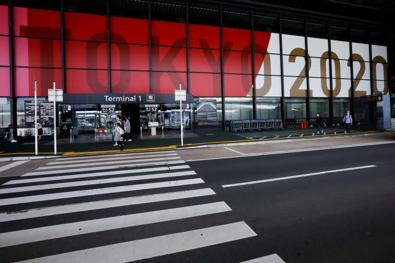 FILE PHOTO: Tokyo 2020 Olympic and Paralympic Games advertisements are displayed at Narita international airport