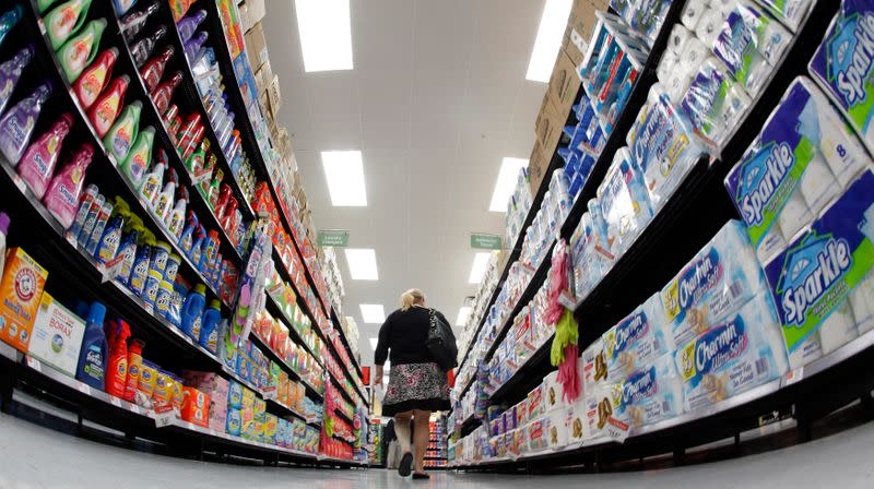 File photo of shopper walking down aisle in newly opened Walmart Neighborhood Market in Chicago