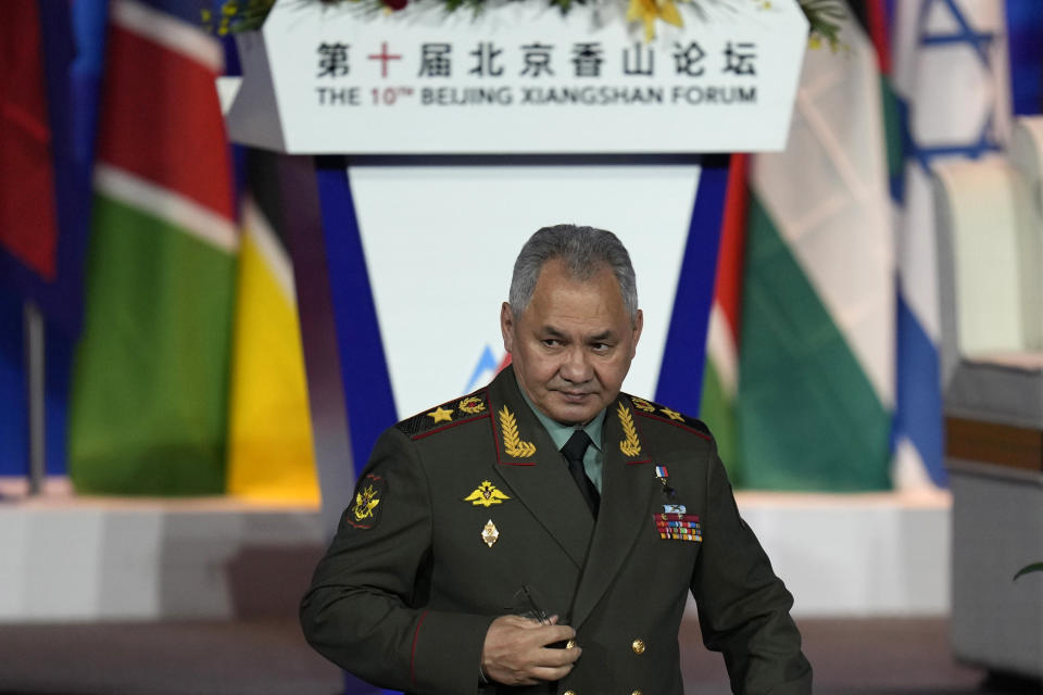 Russian Defense Minister Sergei Shoigu walks down from the podium after speaking at the 10th Beijing Xiangshan Forum in Beijing, Monday, Oct. 30, 2023. Defense Minister Shoigu said Monday the United States is fueling geopolitical tensions to uphold its "hegemony" and warned of the risk of confrontation between major countries. (AP Photo/Ng Han Guan)