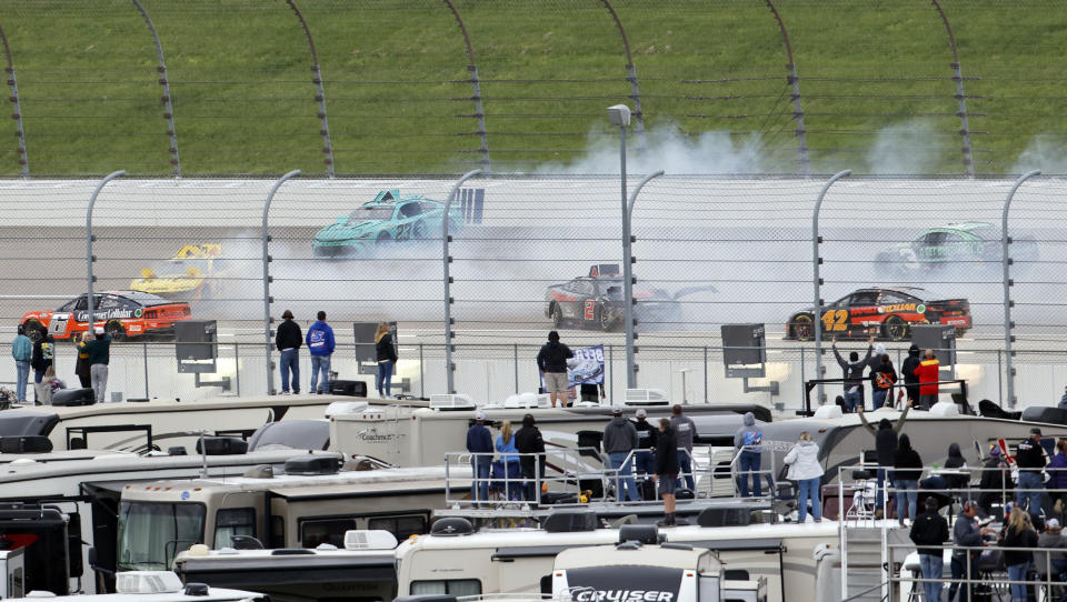 Multiple racers wreck coming out of Turn 3 during a NASCAR Cup Series auto race at Kansas Speedway in Kansas City, Kan., Sunday, May 5, 2024. (AP Photo/Colin E. Braley)