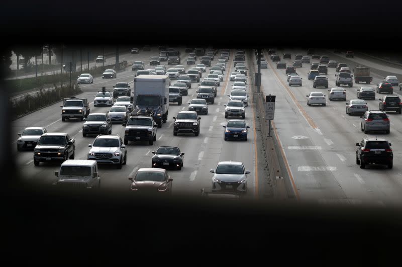 FILE PHOTO: Morning traffic drives on the 405 freeway in Los Angeles