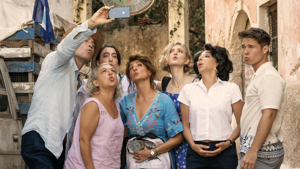 John Corbett, Maria Vacratsis, Melina Kotselou, Nia Vardalos, Elena Kampouris, Andrea Martin, and Elias Kacavas in My Big Fat Greek Wedding 3 (Universal)