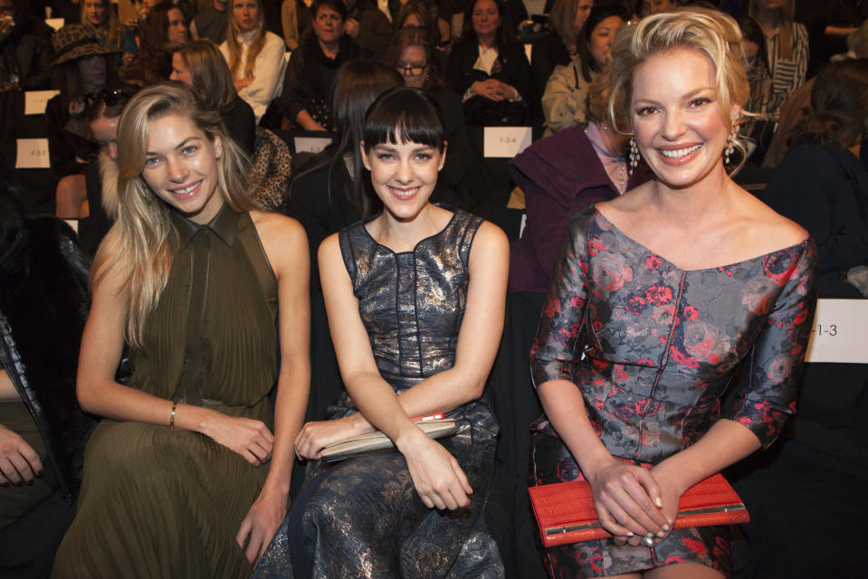 Model Jessica Hart, Actress Jenna Malone and Katherine Heigl sit in the front row at the J. Mendel Autumn/Winter 2013 collection during New York Fashion Week February 13, 2013. REUTERS/Andrew Kelly (UNITED STATES - Tags: FASHION ENTERTAINMENT) - RTR3DR8M