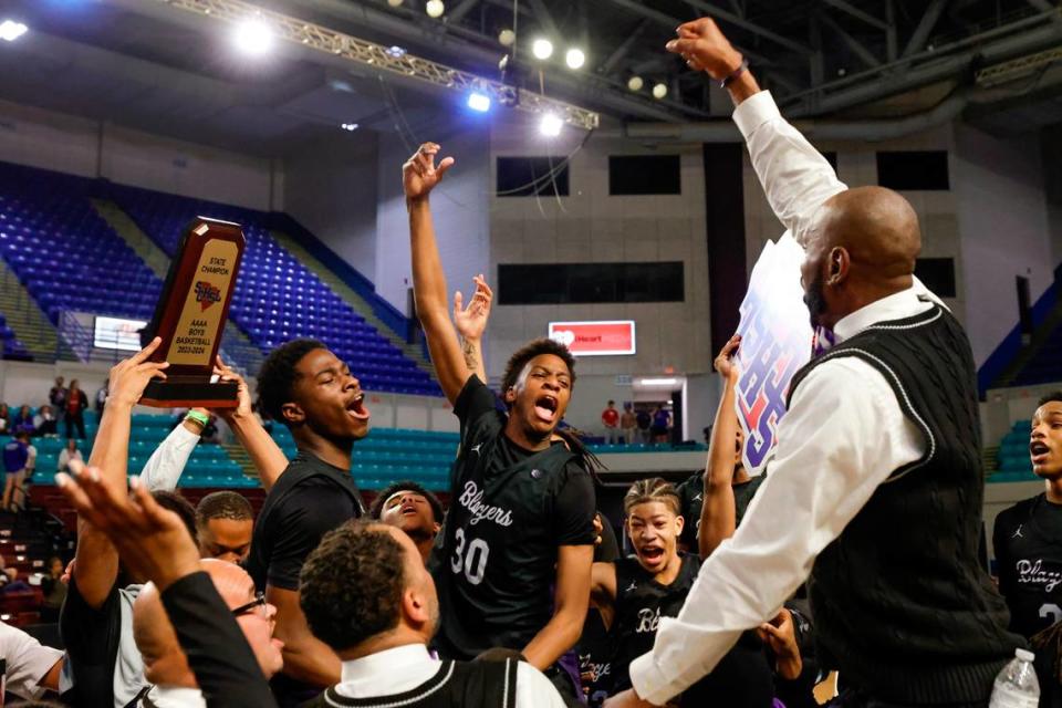 The Ridge View Blazers celebrate winning the Class 4A boys basketball championship game on Saturday, March 2, 2024 at the Florence Center. Ridge View beat Riverside 55-52. Tracy Glantz/tglantz@thestate.com