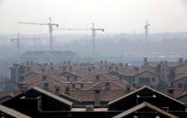 FILE PHOTO: Apartment blocks are pictured in Wuqing District of Tianjin, China October 10, 2016. REUTERS/Jason Lee/File Photo