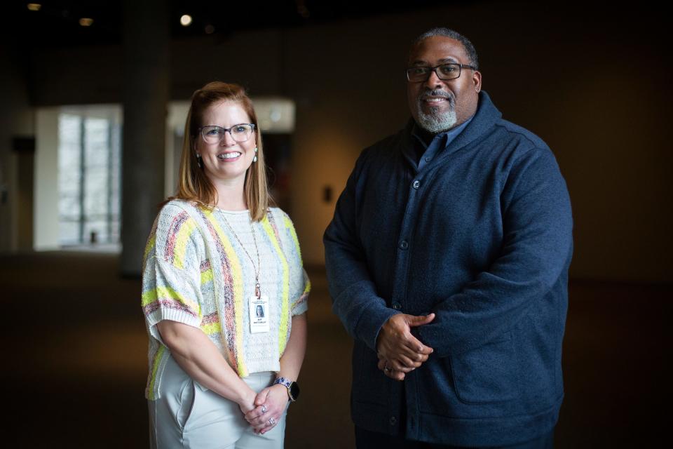 Amy Bottomley (left), director of educational initiatives, and Christopher Miller, senior director of education and community engagement, pose for a photo at the National Underground Railroad Freedom Center in downtown Cincinnati in May 2022.