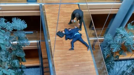 A still image taken from video shows a man, believed to be UK Independence Party (UKIP) Member of the European Parliament (MEP) Steven Woolfe, face down on a floor at the European Parliament in Strasbourg, France, October 6, 2016. REUTERS/ITV News via Reuters TV