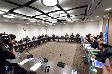 General view of the meeting between the Syrian government delegation and the UN Special Envoy for Syria during Intra Syria peace talks, at the U.N. in Geneva, Switzerland December 14, 2017. REUTERS/ Fabrice Coffrini/Pool