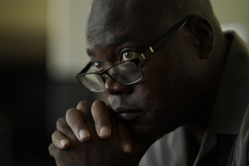 Terrence Hersey sits for a portrait at his home Friday, June 17, 2022, in South Holland, Ill. Hersey underwent extensive rehabilitation for a stroke in 2015, before his doctors eventually cleared him to return to work in 2016. But Union Pacific decided without ever having a doctor examine him that the stroke made him unfit to work for the railroad. Union Pacific has already lost three lawsuits over the way it dismisses employees with health conditions because of safety concerns, and the prospect of hundreds more similar lawsuits, including Hersey's case, looms over the railroad. (AP Photo/Charles Rex Arbogast)