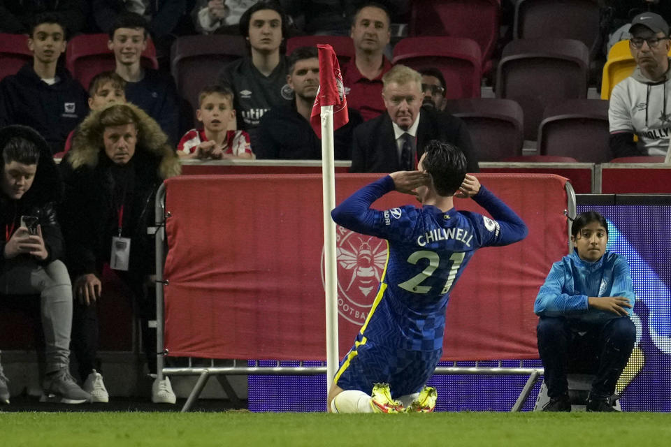 Chelsea's Ben Chilwell celebrates after scoring the opening goal during the English Premier League soccer match between Brentford and Chelsea at Brentford Community Stadium in London, Saturday, Oct. 12, 2021. (AP Photo/Matt Dunham)