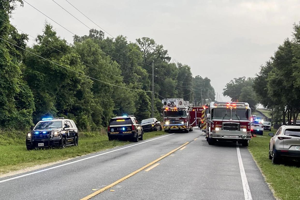 <span>Emergency crews respond to a bus crash in Marion county, Florida, on 14 May.</span><span>Photograph: Marion County Sheriff's Office via Facebook</span>