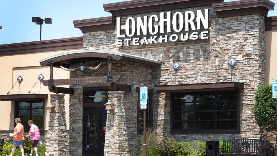 Customers leave a LongHorn Steakhouse restaurant on June 22, 2023 in Skokie, Illinois. - Scott Olson/Getty Images