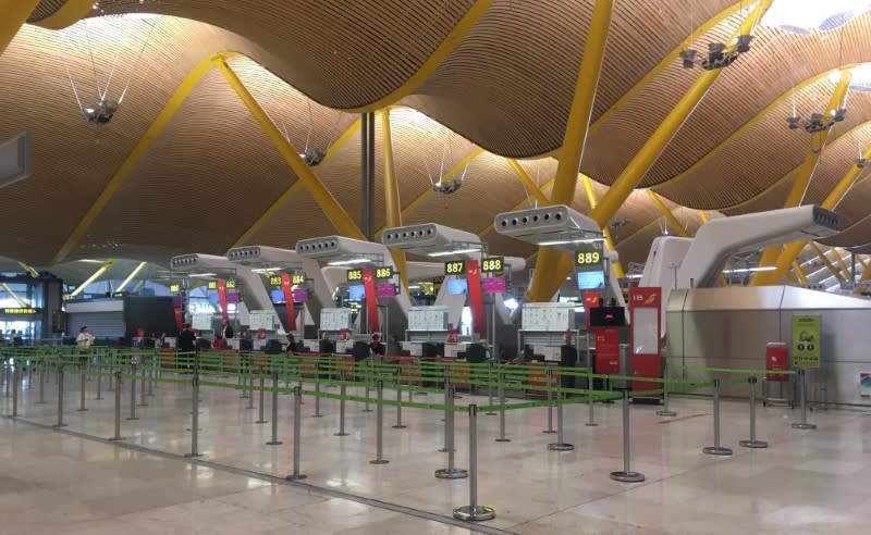 Empty Iberia check-in counters are seen at Madrid's Adolfo Suarez Barajas Airport