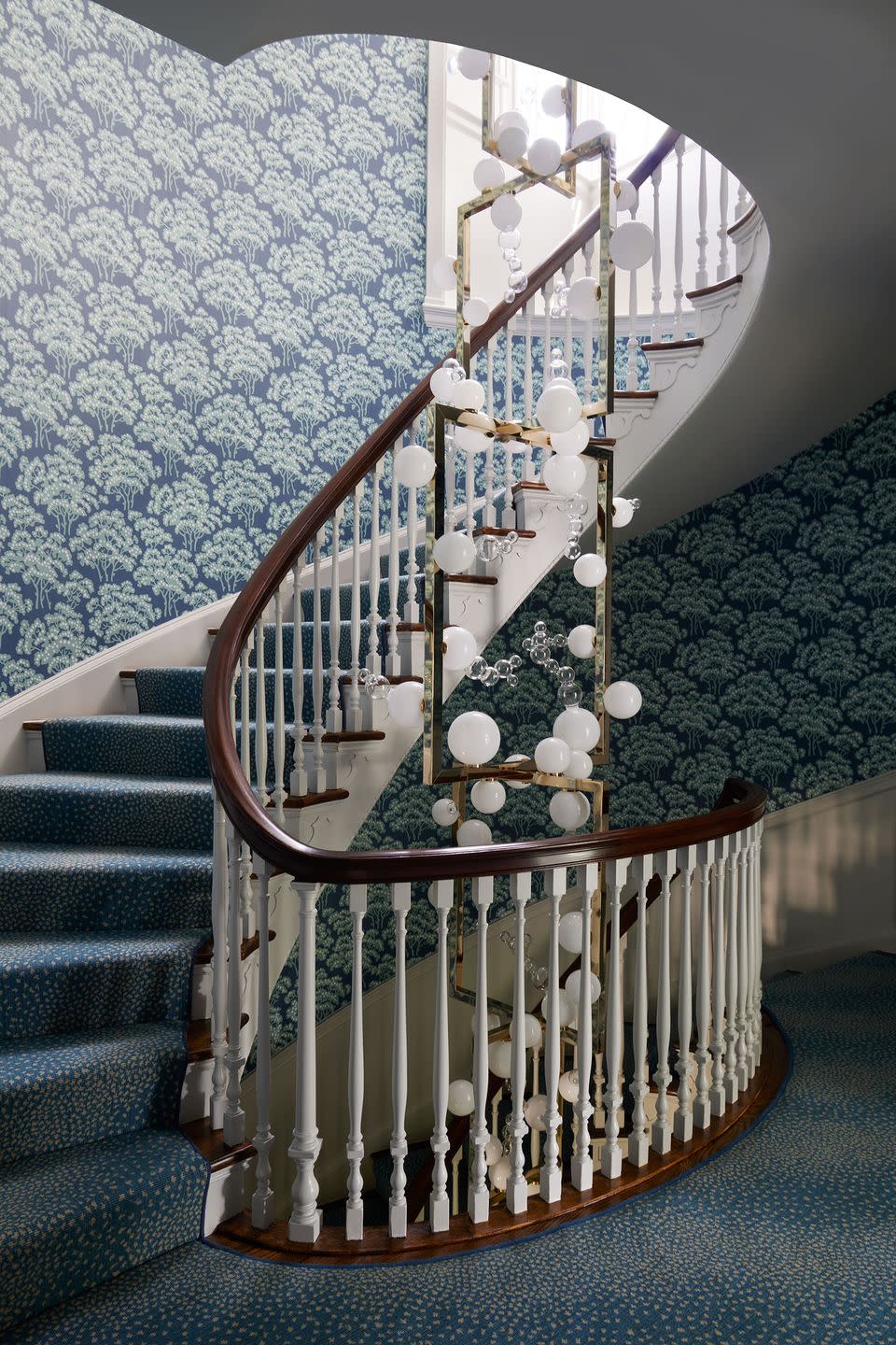 a staircase with white railings