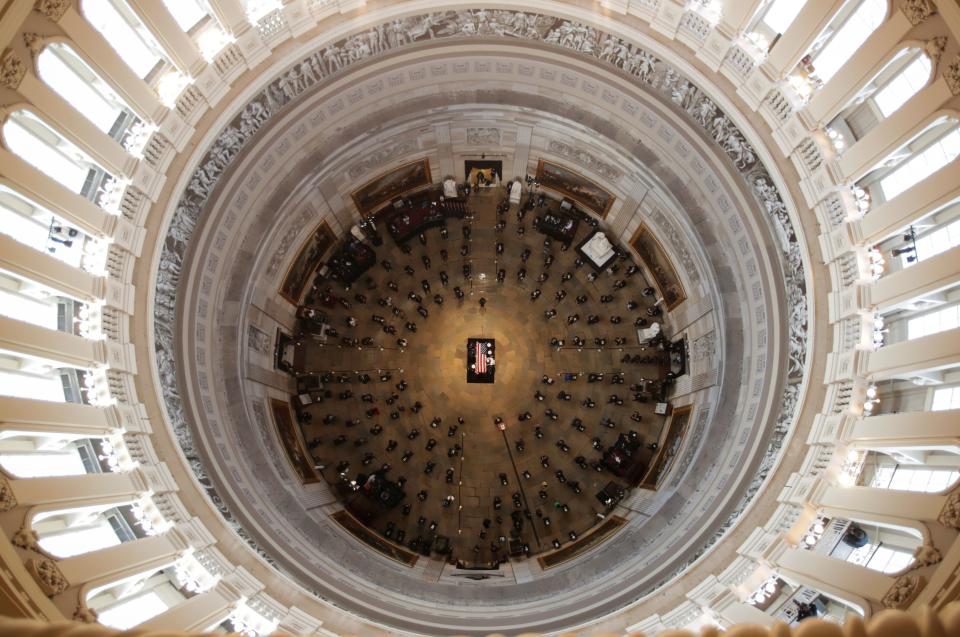 The casket of civil rights pioneer Rep. John Lewis (D-Ga.) is placed by a U.S. military honor guard at the center of the Capitol Rotunda to lie in state in Washington, D.C., July 27, 2020. (Jonathan Ernst / Reuters)