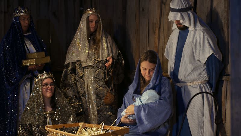 Actors perform in a living Nativity scene at University Place in Orem on Friday, Dec. 6, 2019.