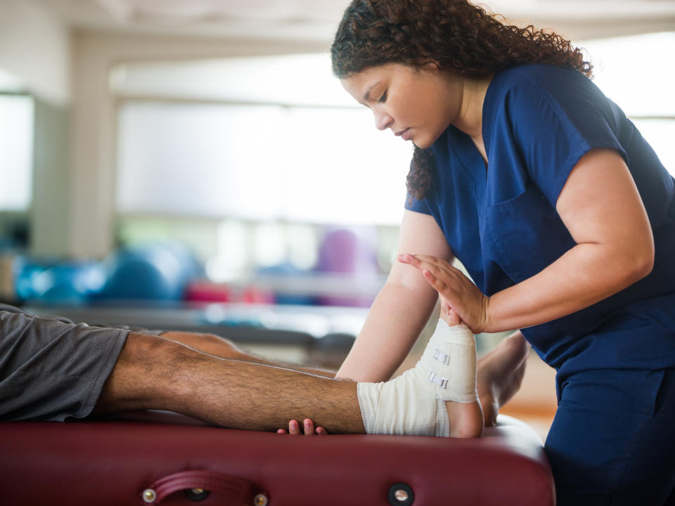 person exercising a person's foot