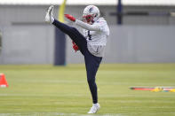 New England Patriots wide receiver DeVante Parker warms up during an NFL football practice, Tuesday, Dec. 6 2022, in Foxborough, Mass. (AP Photo/Steven Senne)