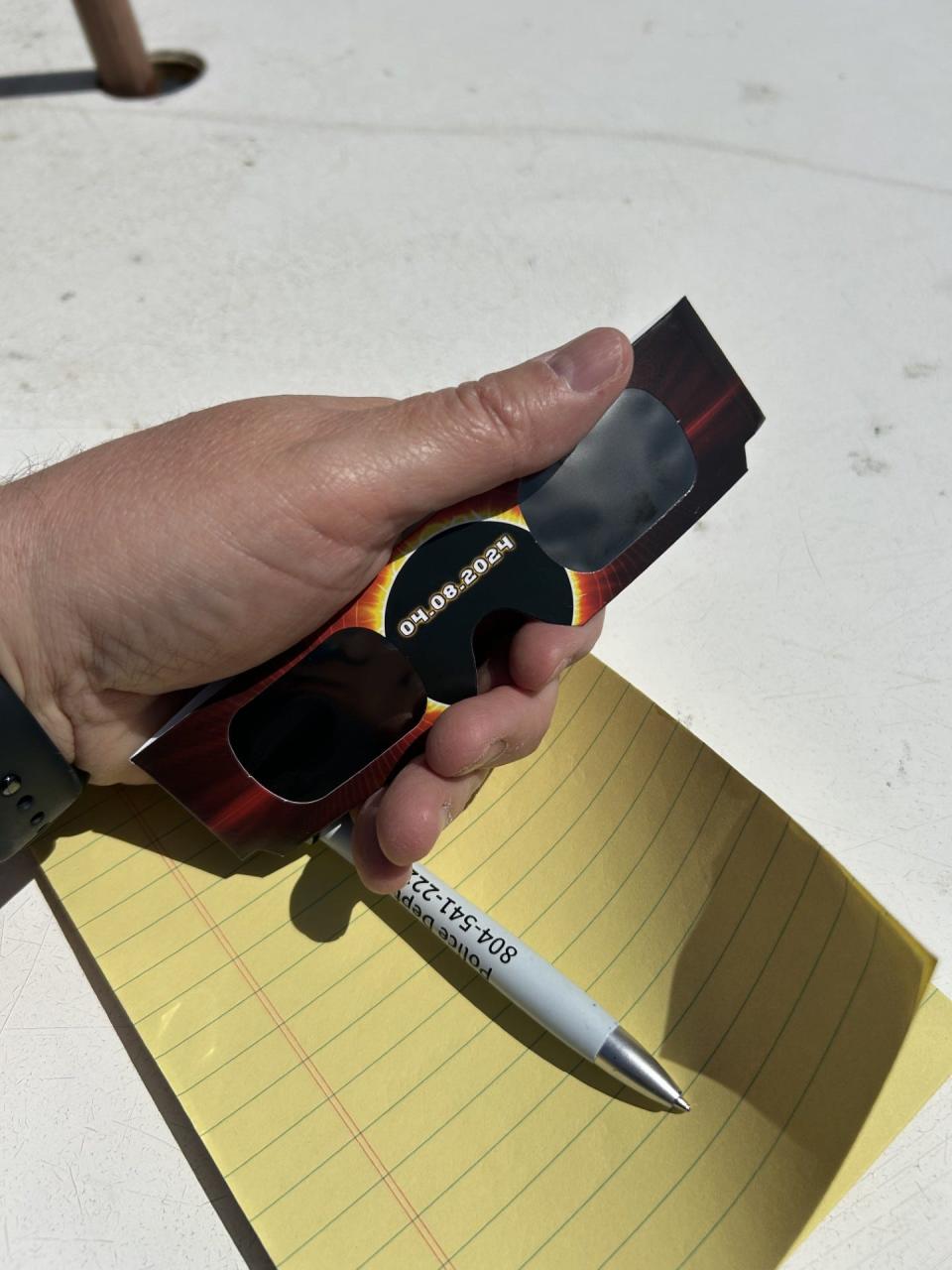 No play-by-play of the solar eclipse would be complete without the proper solar-eclipse glasses and a notebook for reporting news the old-school way.
