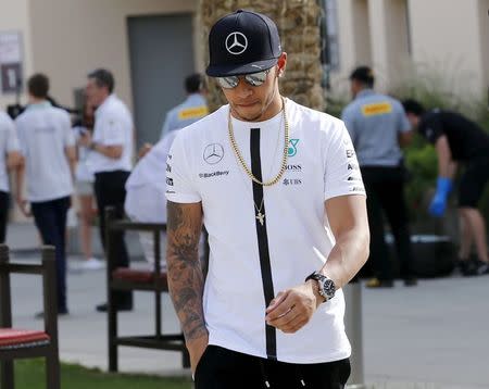 Mercedes Formula One driver Lewis Hamilton of Britain leaves the pit-lane at the end of the first free practice ahead of Bahrain's F1 Grand Prix at Bahrain International Circuit, south of Manama April 17, 2015. REUTERS/Ahmed Jadallah