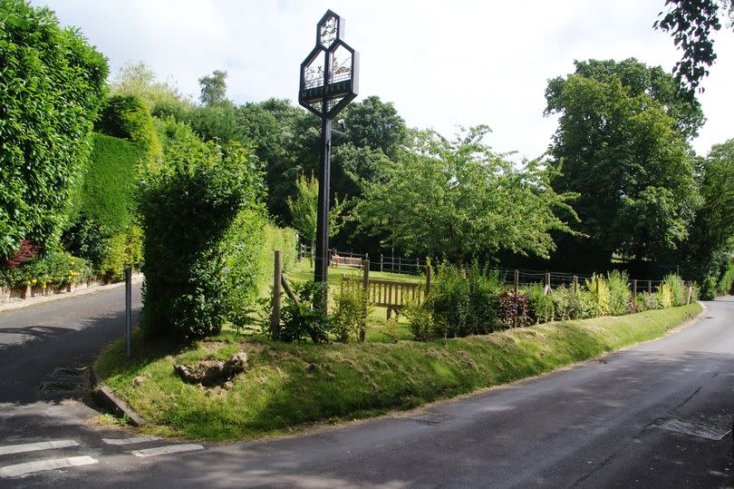 The beautiful hamlet of Westbere in Kent - lovely old sign with a lane and lots of trees and grass