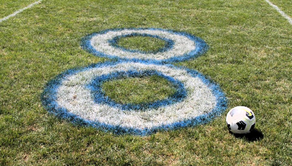 Brian Kenealy's retired No.8 that he wore as a member of the York High School boys soccer team is painted on the soccer field at York High School.