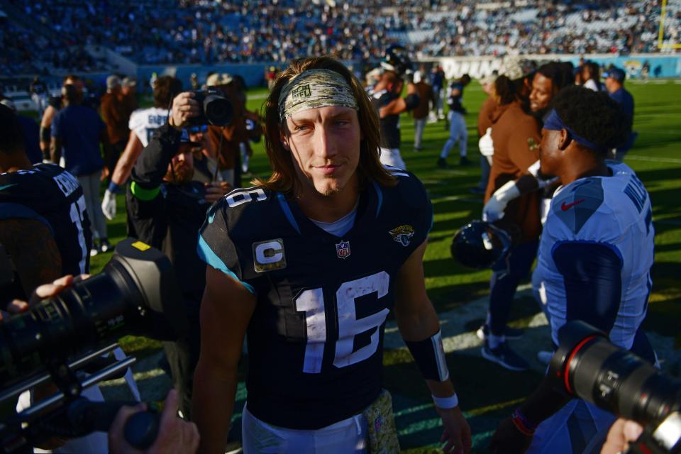 Jacksonville Jaguars quarterback Trevor Lawrence (16) shakes hands with players after the game an NFL football matchup Sunday, Nov. 19, 2023 at EverBank Stadium in Jacksonville, Fla. The Jacksonville Jaguars defeated the Tennessee Titans 34-14. [Corey Perrine/Florida Times-Union]