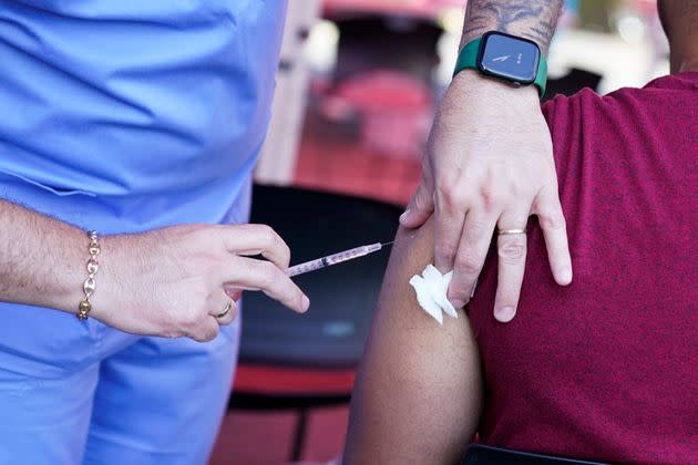 A nurse administers a monkeypox vaccine at a walk-in clinic at the North Jersey Community Research Initiative in Newark, N.J., Tuesday, Aug. 16, 2022. On Thursday, Aug. 18, 2022, U.S. health officials said they were making extra monkeypox vaccines available to places with events expected to draw crowds of men who have sex with men. (AP Photo/Seth Wenig, File) (Photo: via Associated Press)