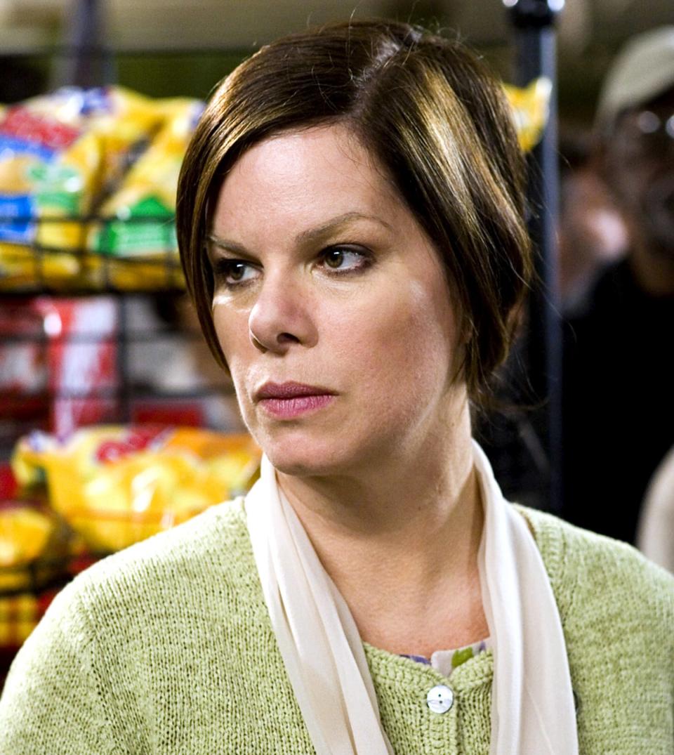 Marcia Gay Harden as Mrs. Carmody in the mist looking mean