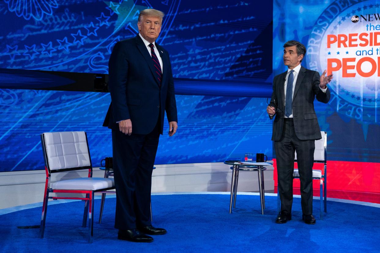 Donald Trump and ABC News anchor George Stephanopoulos at a town hall event Tuesday night in Philadelphia. (AP)