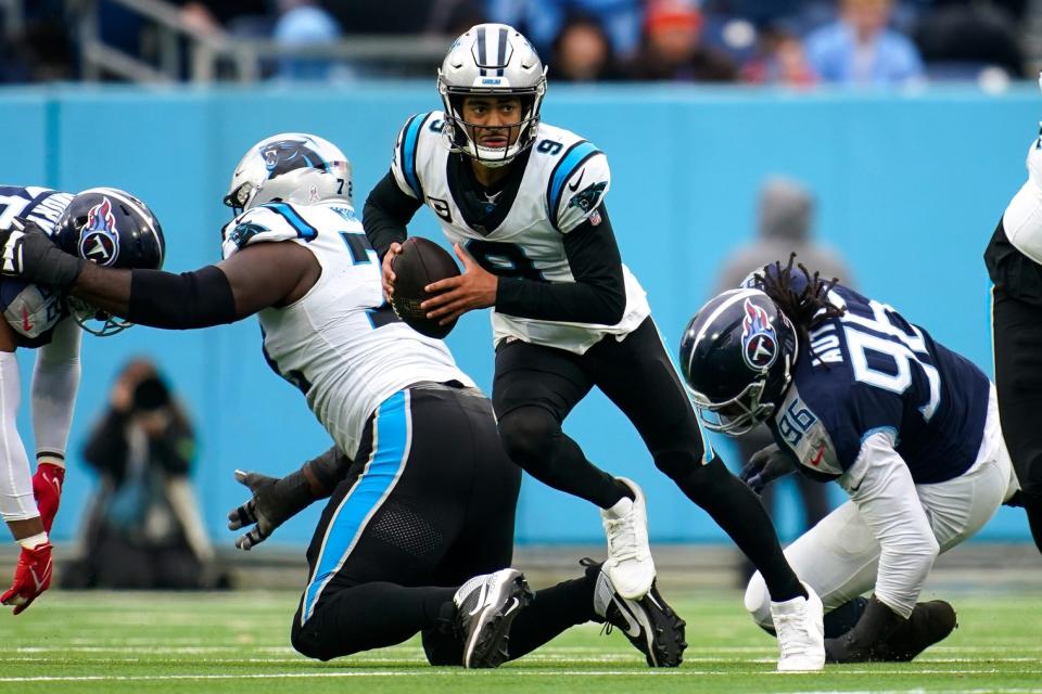 Carolina Panthers quarterback <a class="link " href="https://sports.yahoo.com/nfl/players/40029/" data-i13n="sec:content-canvas;subsec:anchor_text;elm:context_link" data-ylk="slk:Bryce Young;sec:content-canvas;subsec:anchor_text;elm:context_link;itc:0">Bryce Young</a> (9) runs the ball against the Tennessee Titans during the third quarter at Nissan Stadium in Nashville, Tenn., Sunday, Nov. 26, 2023.