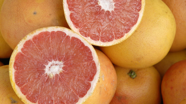 Sliced pink grapefruit halves