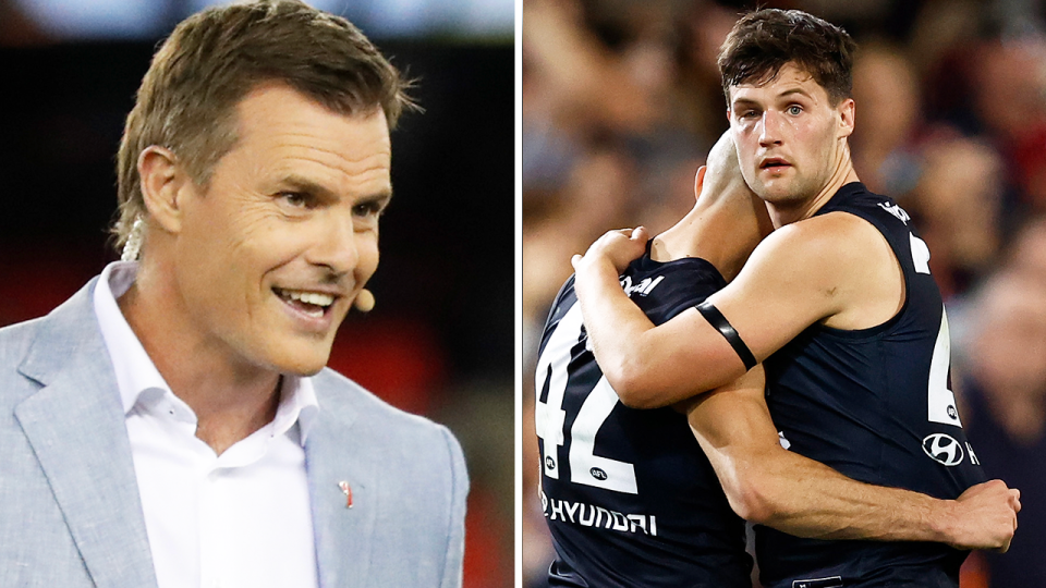 Luke Darcy smiles and Carlton players devastated.