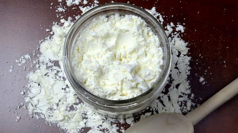 Open container of heavy cream powder