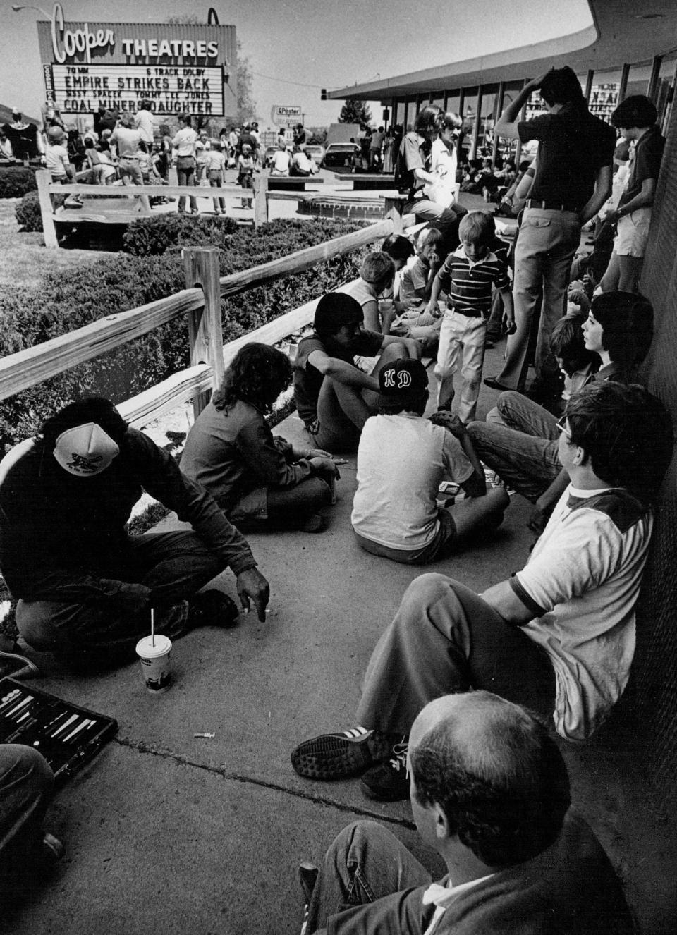 People wait to get into a screening of "Star Wars: The Empire Strikes Back" on May 22, 1980.&nbsp;