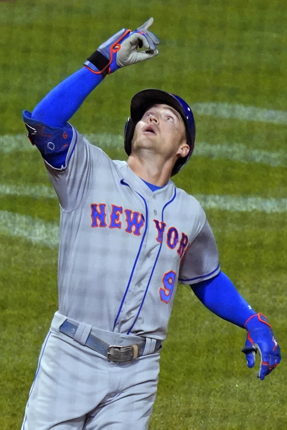 New York Mets' Brandon Nimmo crosses home plate after hitting a two-run home run off Pittsburgh Pirates relief pitcher Robert Stephenson during the seventh inning of a baseball game in Pittsburgh, Tuesday, Sept. 6, 2022. (AP Photo/Gene J. Puskar)