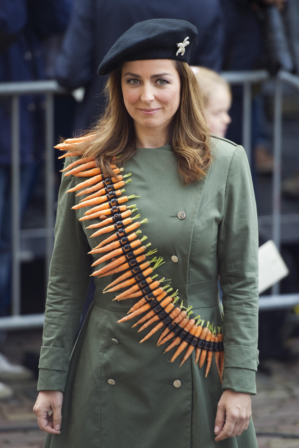 Marianne Thieme of the Party for Animals wearing a string of home grown carrots arriving at the "Hall of Knights" for the formal opening of the new parliamentary year in The Hague, Netherlands, Tuesday, Sept. 18, 2012. Queen Beatrix will address the nation amid the usual pomp and circumstance, but the in uncomfortable knowledge that her speech was written by a Cabinet that is about to be replaced after national elections last week. (AP Photo/Paul Vreeker, Pool)