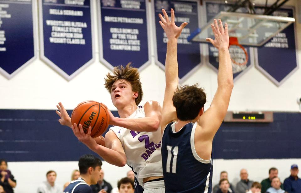 Dave Carr (2) of Rumson Fair Haven drives to the basket against Jack O’Reilly (11) of Manasquan during boy’s basketball game at Manasquan High School in Manasquan, N.J. Friday, March 3, 2024 Noah K. Murray-Correspondent/Asbury Park Press