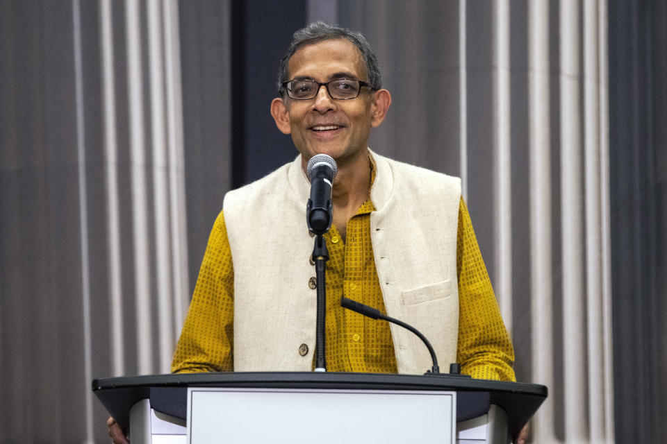 Abhijit Banerjee speaks during a news conference at Massachusetts Institute of Technology in Cambridge, Mass., Monday, Oct. 14, 2019. Banerjee along with Esther Duflo and Harvard's Michael Kremer, were awarded the 2019 Nobel Prize in economics for pioneering new ways to alleviate global poverty. (AP Photo/Michael Dwyer)