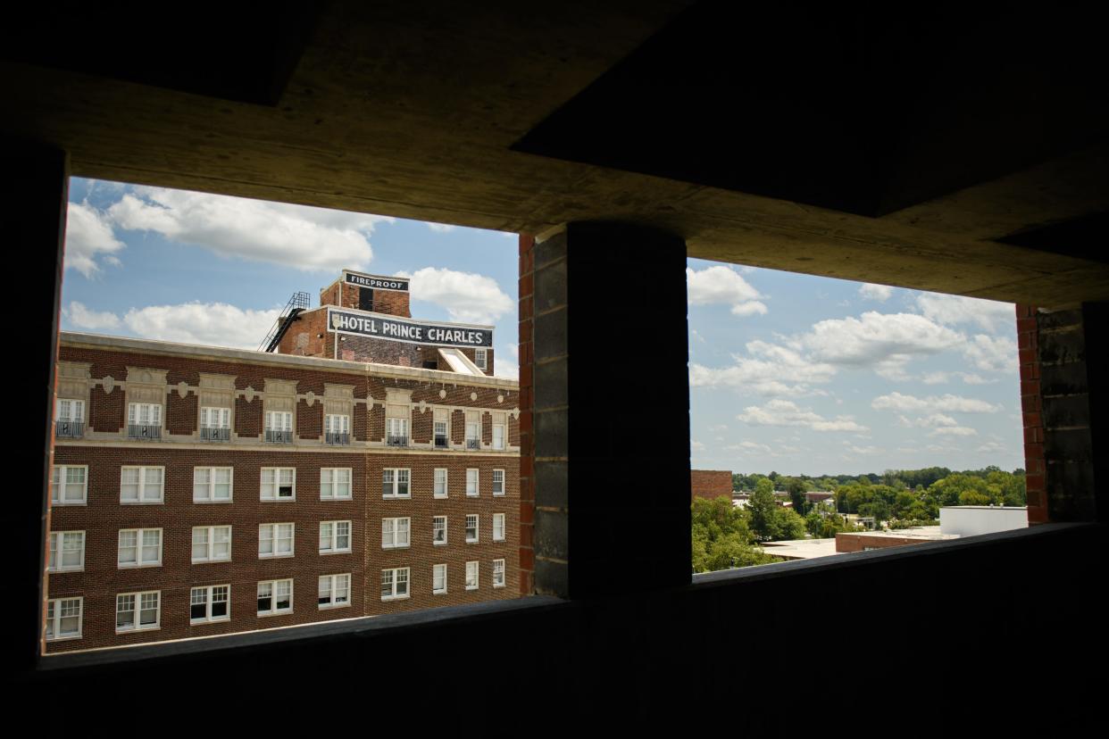 A view of the Prince Charles apartment building from the Hay Street parking deck, Tuesday, Aug. 8, 2023.