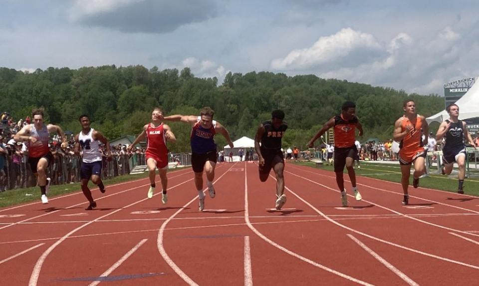 Cathedral Prep's Wakeem Page (fourth from right) edges Fort LeBoeuf's Tristin Harris (fourth from left) in the Class 3A 100-meter dass at the District 10 track and field championships at Slippery Rock University on Saturday, May 21, 2022.