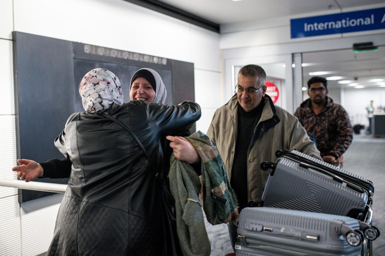 Sarah Shannan hugs her mother Mona Shannan as her father Ayman watches after arriving at Detroit Metro Airport from Egypt on Wednesday, March 27, 2024.