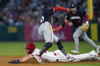 Los Angeles Angels' Mike Trout, bottom, is picked off stealing second by Minnesota Twins shortstop Willi Castro, front top, during the fourth inning of a baseball game, Friday, April 26, 2024, in Anaheim, Calif. (AP Photo/Ryan Sun)