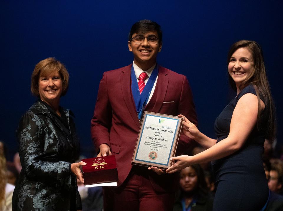 Rickards High School senior Shreyas Kodela accepts the Excellence in Volunteerism award during the 2022 Best and Brightest awards ceremony on Wednesday, May 11, 2022 at Ruby Diamond Concert Hall in Tallahassee, Fla. 