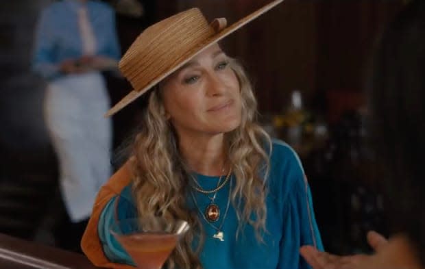 Carrie in a Rodney Patterson boater hat.<p>Screenshot: 'And Just Like That' trailer/HBO Max</p>