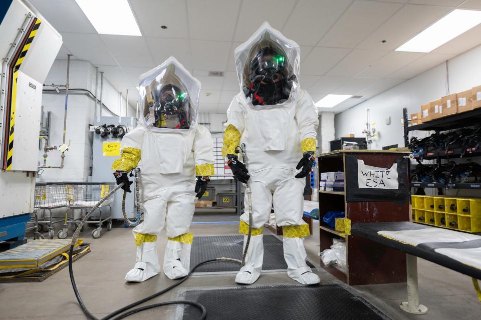 Maintenence employees wear protective equipment used in one of the final destruction processes at the Pueblo Chemical Agent-Destruction Pilot Plant (PCAPP) on Thursday, June 8, 2023.