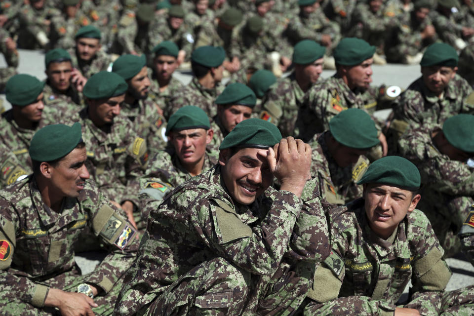 Afghan National Army attend their graduation ceremony from a 3-month training program at the Afghan Military Academy in Kabul, Afghanistan, Monday, May 27, 2019. (AP Photo/Rahmat Gul)