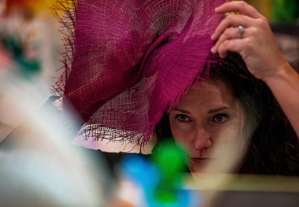 Rachel Bell works on a Derby creation in The Hat Girls shop located at 211 Clover Lane in St. Matthews. The Hat Girls are one of three Featured Milliners of 149th Kentucky Derby. Mar. 9, 2023