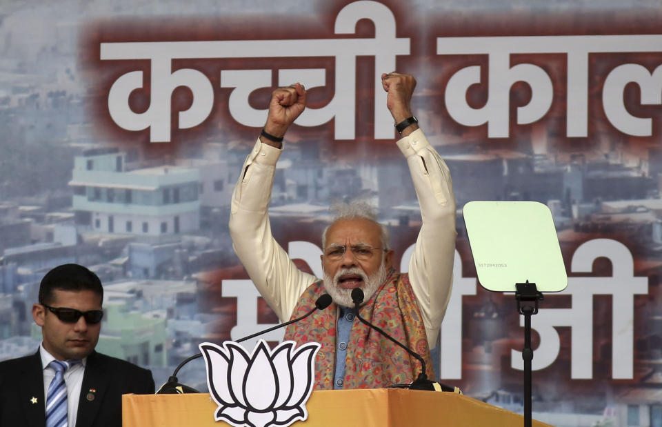 Indian Prime Minister Narendra Modi addresses a rally of his Hindu nationalist Bharatiya Janata Party in New Delhi, India, Sunday, Dec. 22, 2019. Clashes continued Sunday between Indian police and protesters angered by a new citizenship law that excludes Muslims, as Modi used the rally to defend the legislation, accusing the opposition of pushing the country into a "fear psychosis." (AP Photo)