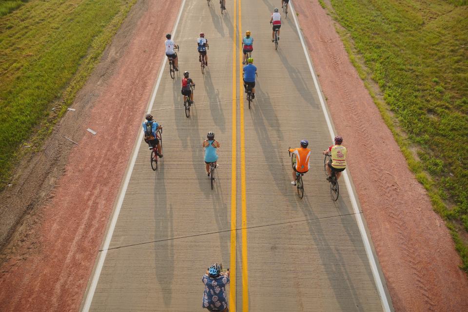 Riders roll out of Sioux City to start RAGBRAI 50 on July 23, 2023.